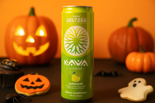Kava Seltzer can with Halloween-themed decorations including pumpkins and cookies.