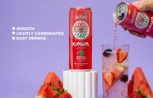 Mitra9 Strawberry Watermelon Kava Seltzer can with fresh watermelon, strawberries, and blackberries, poured over ice in a glass, showcasing a smooth, lightly carbonated non-alcoholic kava drink for alcohol-free relaxation.